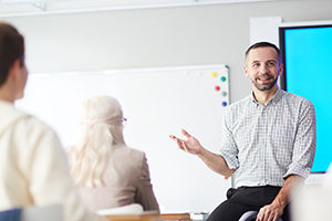 man teaching class